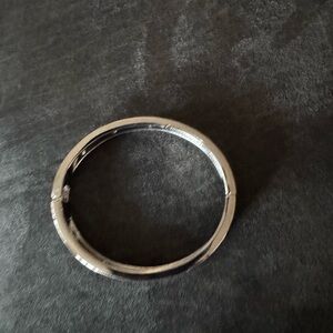 NWOT- Stainless steel Silver Tone Hinged Bangle Bracelet.